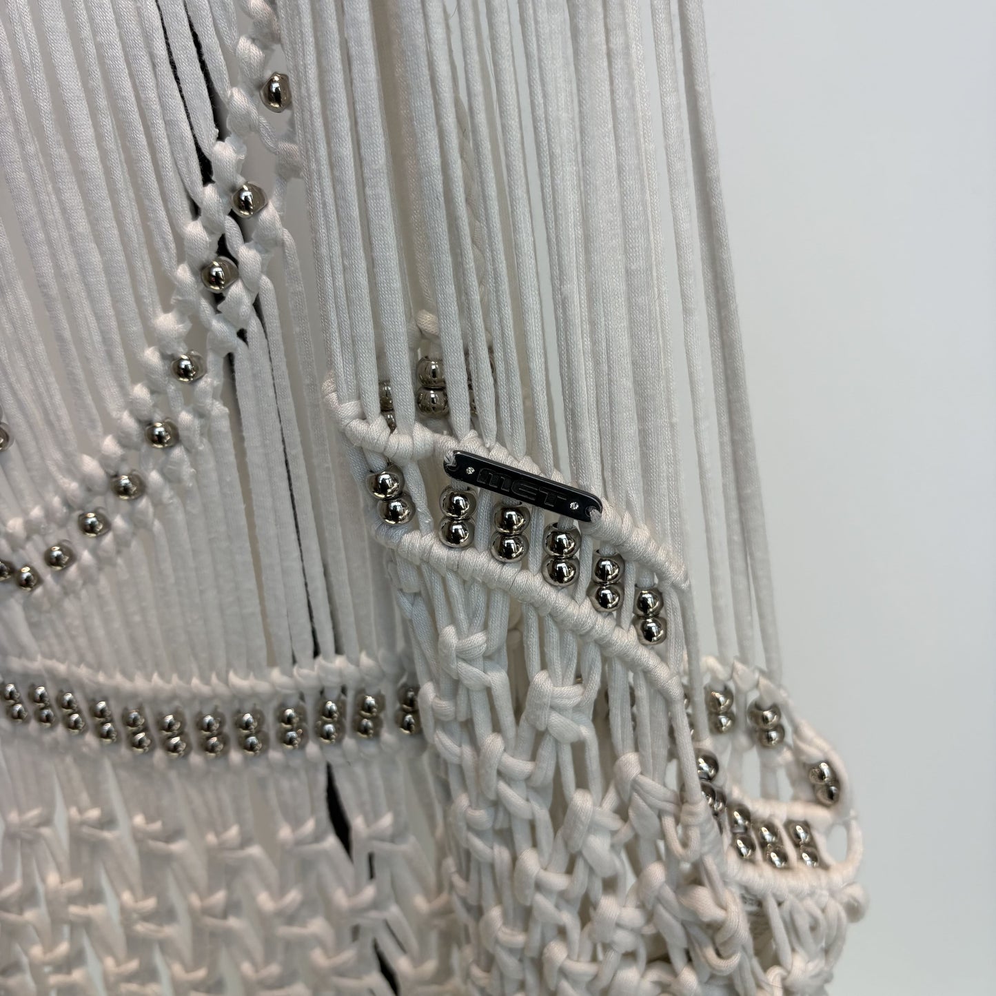 Small white fringe crochet vest